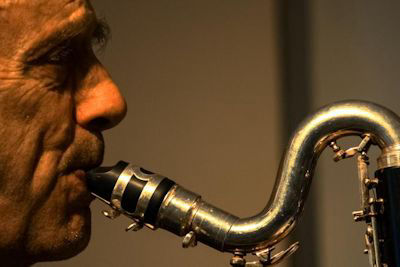 Paul Pingon playing bass clarinet - image courtesy of mopomoso.com; rent bass clarinets here
